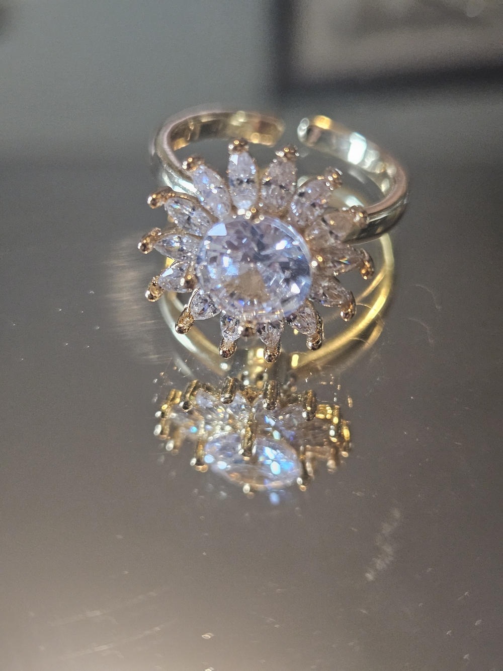 Sparkling Sunburst Crystal Spinner Ring - Gold Tone